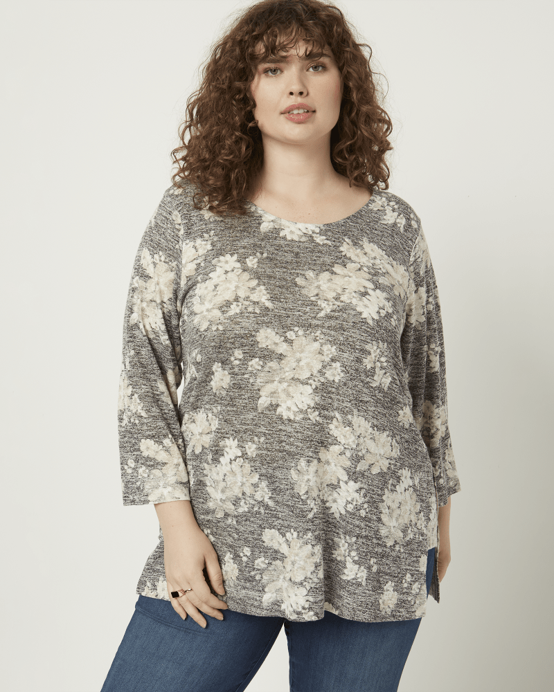 Front of a model wearing a size 1X Saylor Step Hem Tunic in Black / Light Grey by Molly & Isadora. | dia_product_style_image_id:210321